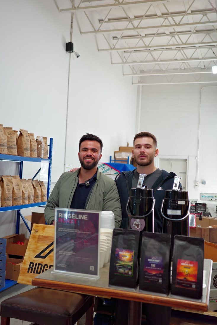 Drin and Zee at the Ridgeline roastery with the coffee lineup