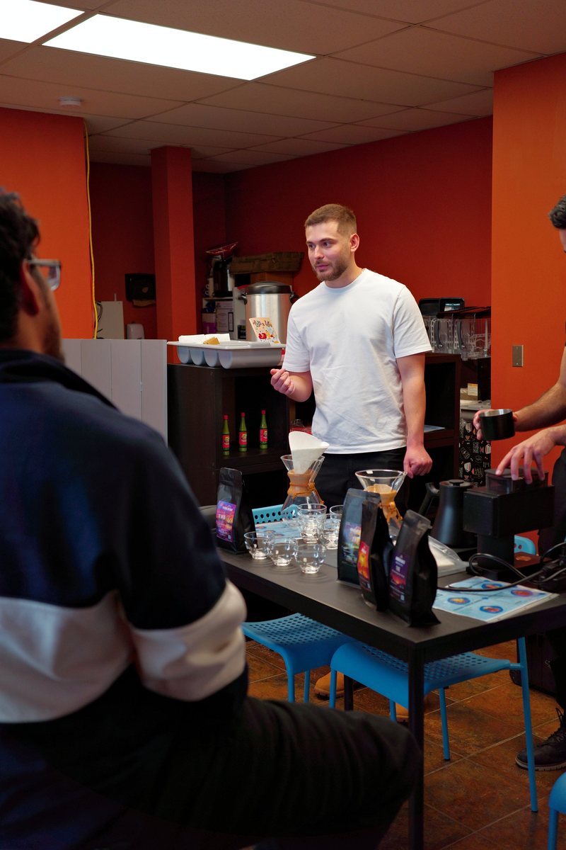 Ridgeline Roast running a coffee tasting at a client shop